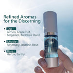 Hand holding a skincare serum bottle with a cloud background and text about refined aromas.