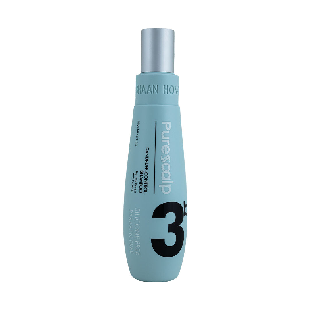 A bottle of Purescalp 3 Volume Silicone Free Hair Smoother in a light blue color with a silver cap, shown on a plain white background.