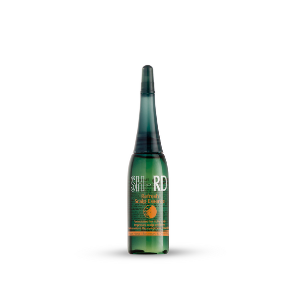 A green glass spray bottle of SH-RD Refresh Scalp Exfoliator with a dark green nozzle, centered on a white background with a soft shadow.