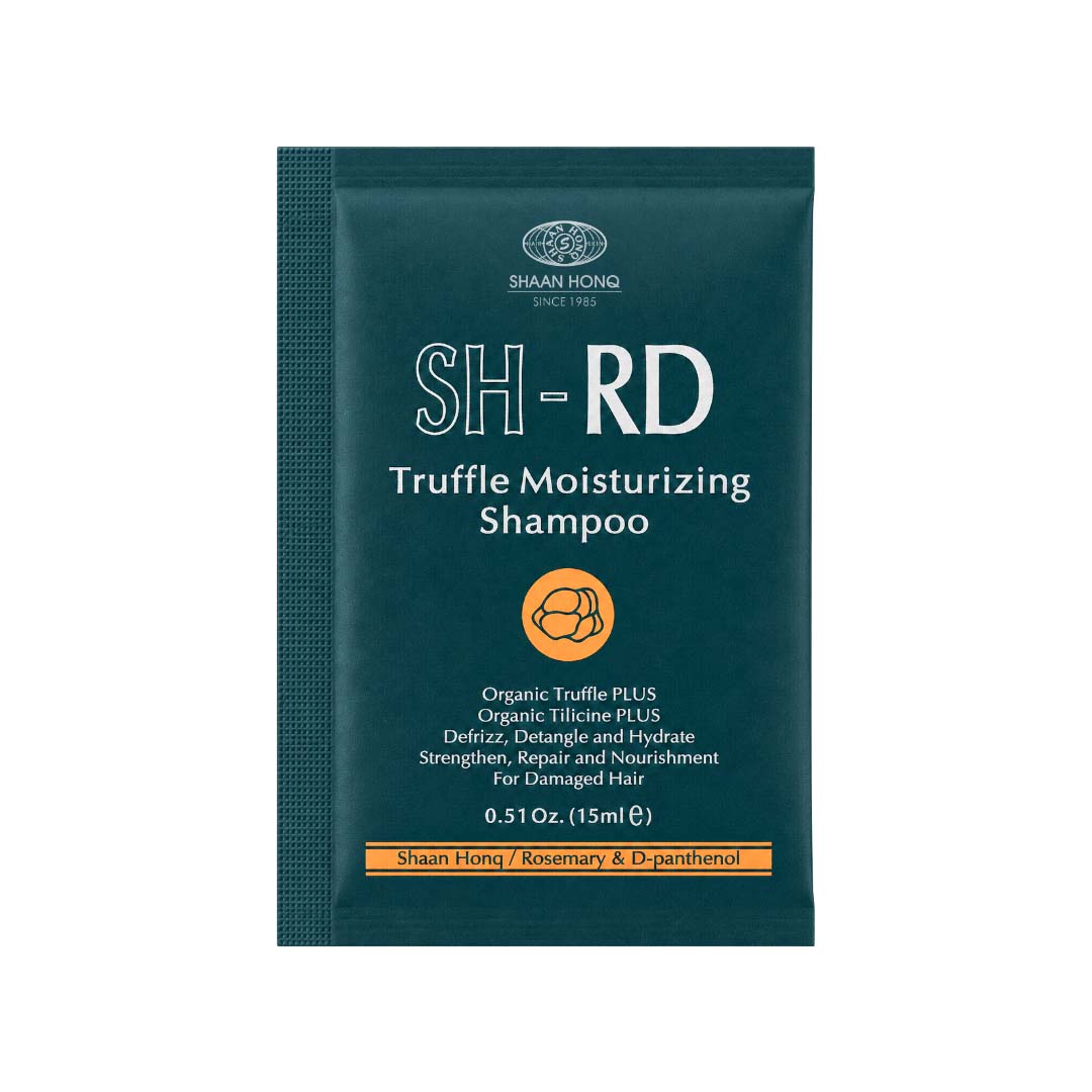 SH-RD Truffle Moisturizing Shampoo single-use sachet packet in dark teal with white and orange text and logo, shown on a plain white background.